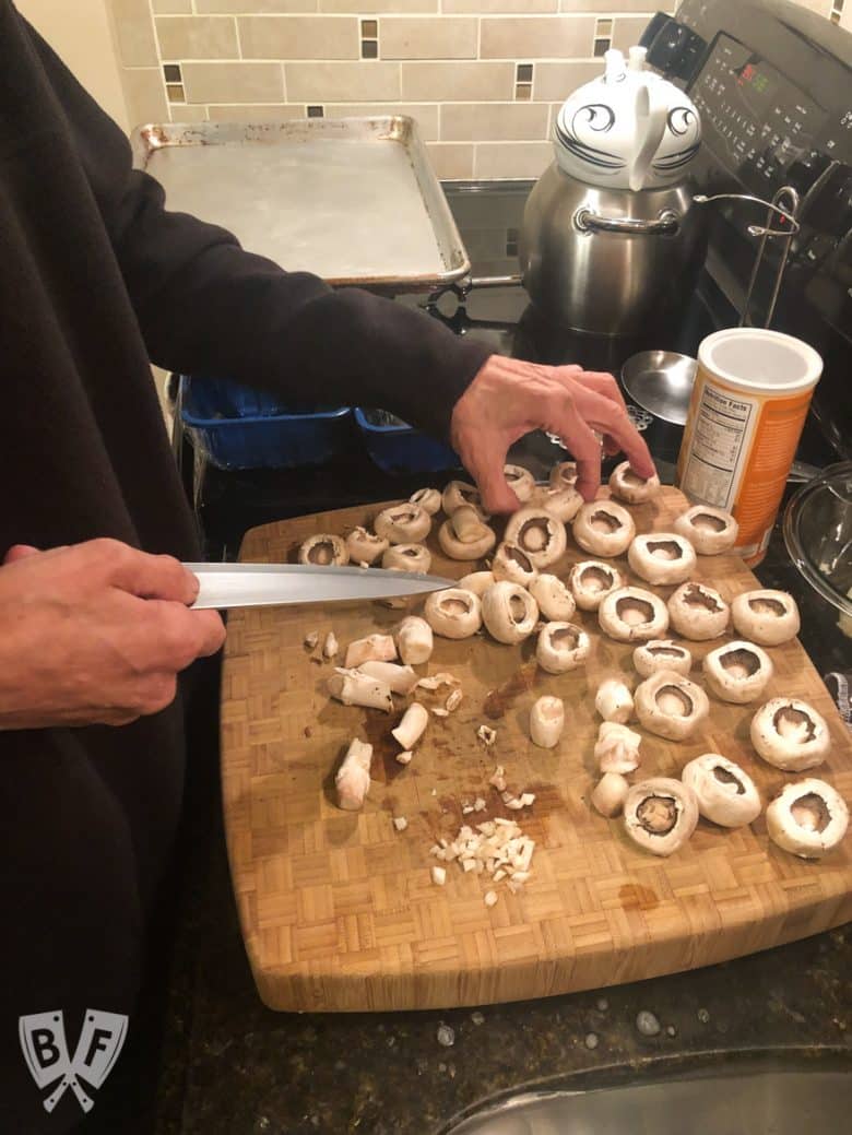 Preparing mushrooms to be stuffed.