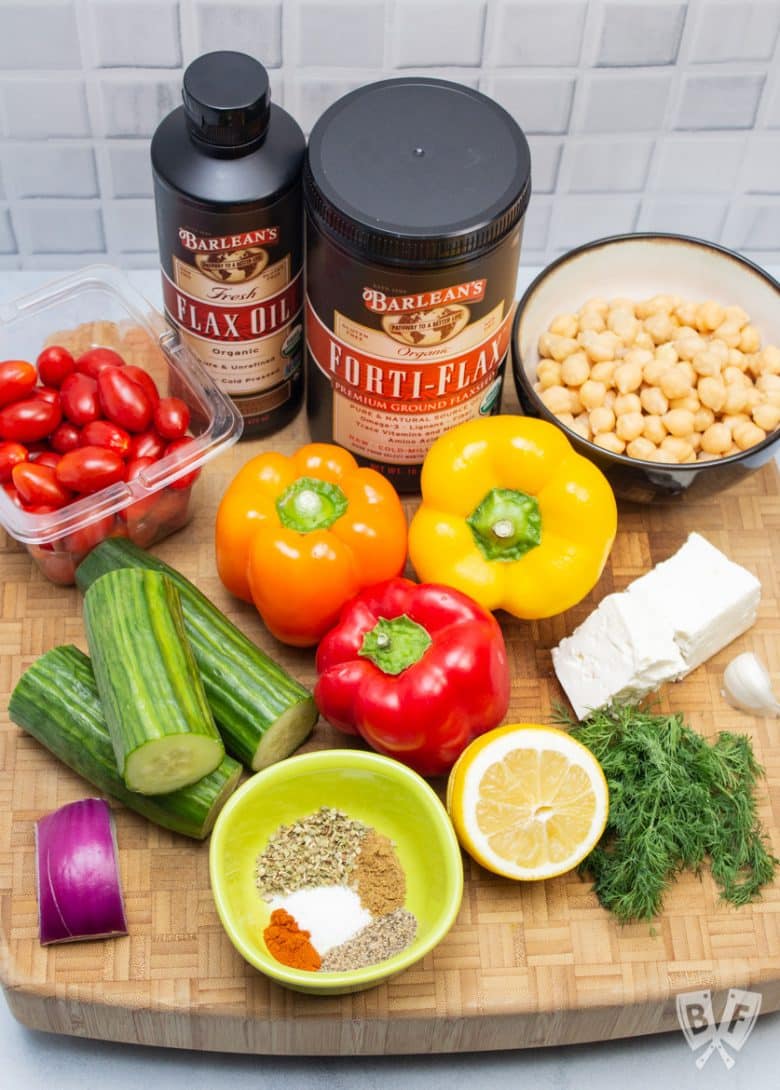 Overhead view of ingredients for Mediterranean Chickpea Salad with Lemon-Herb Vinaigrette