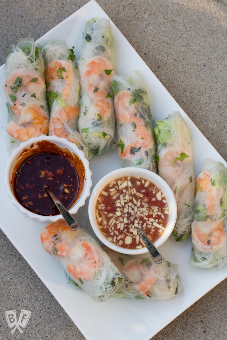 Platter of Vietnamese fresh spring rolls with shrimp and 2 dipping sauces.