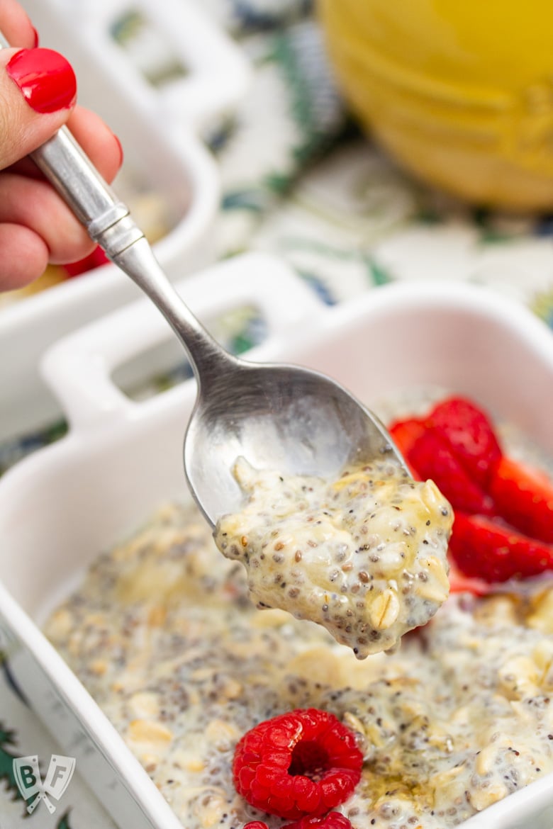 Scooping a spoonful of Lemon Poppy Seed CBD Chia Pudding from a bowl