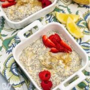 2 bowls of Lemon Poppy Seed CBD Chia Pudding garnished with berries