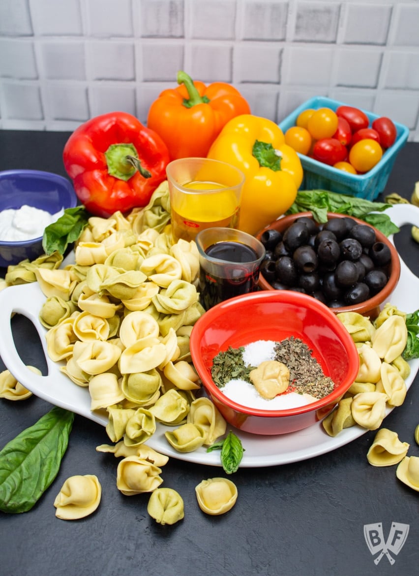 Ingredients ready to make pasta salad skewers.