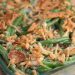 Casserole dish full of green bean casserole for Thanksgiving