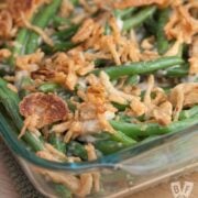 Casserole dish full of green bean casserole for Thanksgiving