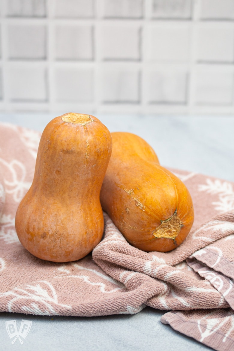 Two whole honeynut squash