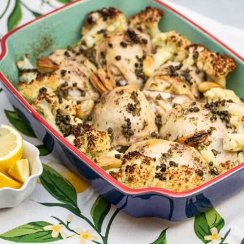 Baking dish filled with Roasted Lemon-Rosemary Chicken & Cauliflower