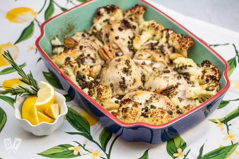 Baking dish filled with Roasted Lemon-Rosemary Chicken & Cauliflower