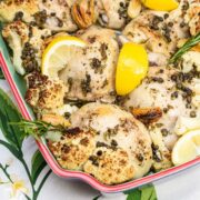 Baking dish filled with Roasted Lemon-Rosemary Chicken & Cauliflower