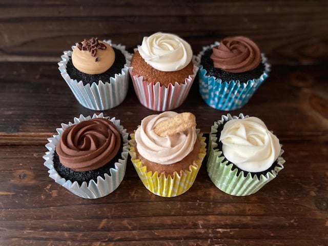 A variety of 5 cupcakes from Rolling out Memories.