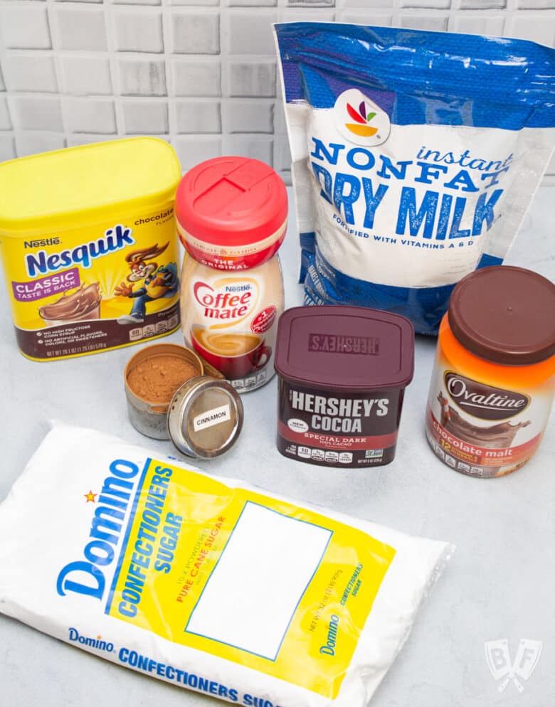 Lineup of ingredients for homemade hot cocoa mix.