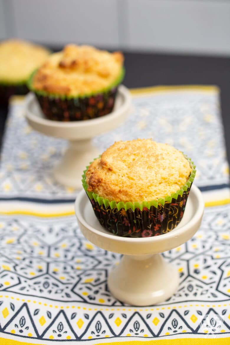 Sweet corn muffins on top of muffin stands.