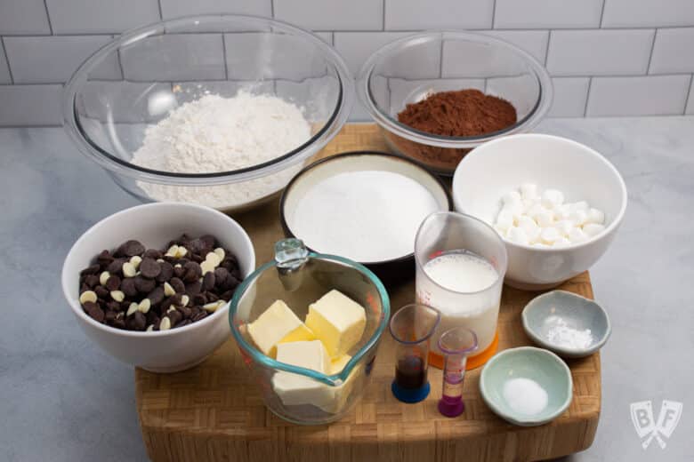 Ingredients for peppermint hot chocolate cookies in bowls.