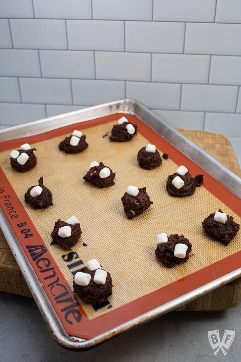 A dozen peppermint hot chocolate cookies ready to go into the oven.