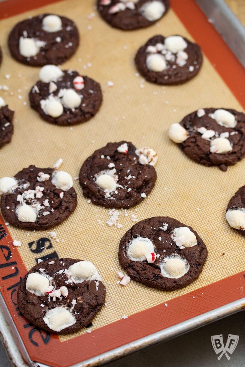 Chocolate cookies topped with marshmallows and crushed peppermint candy.