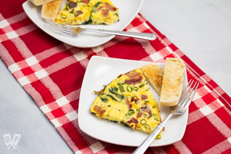 Spinach, bacon, green onion, and cheddar frittata with toasted English muffin.