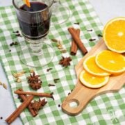 Mulled red wine with spices and orange slices.