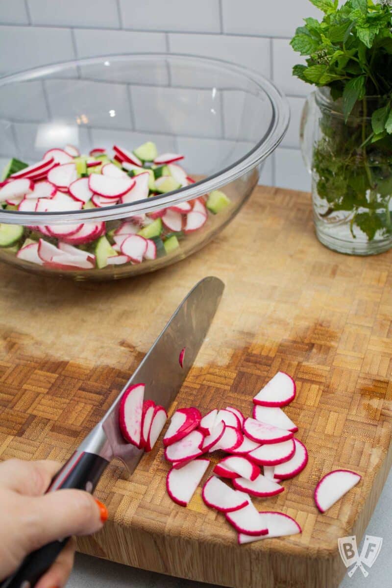 Slicing radishes.