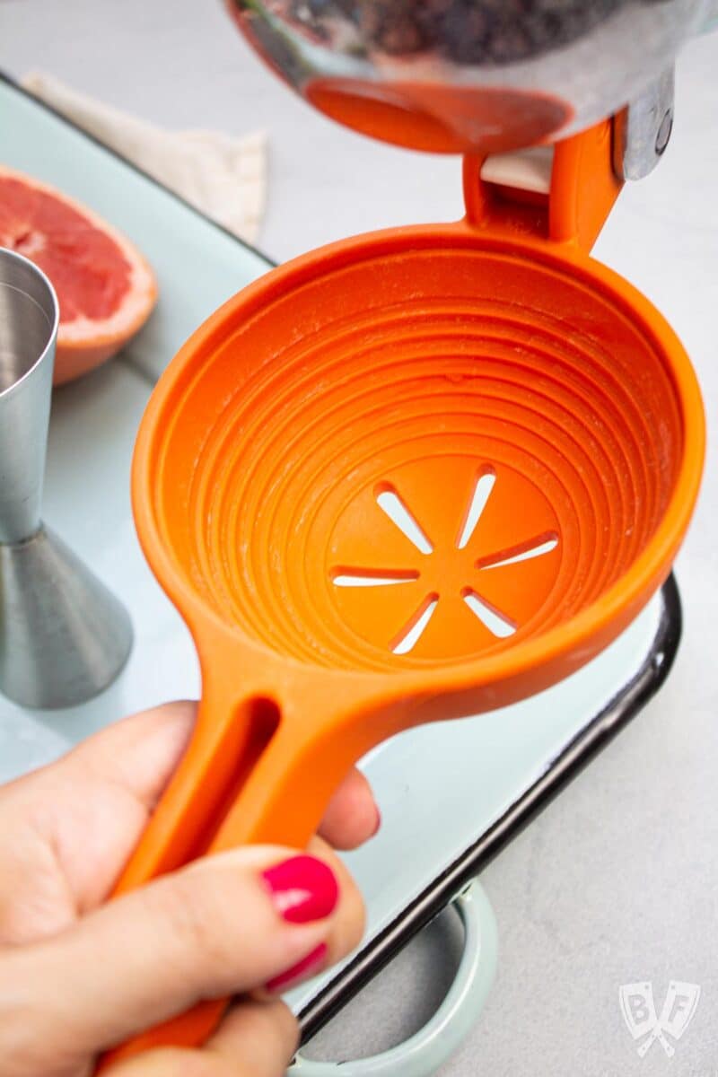 Large citrus squeezer ready to make a cocktail.