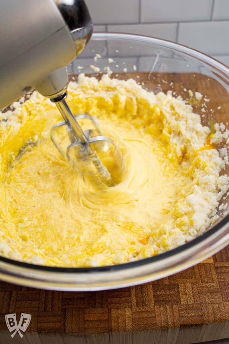 Electric mixer making cookie dough.