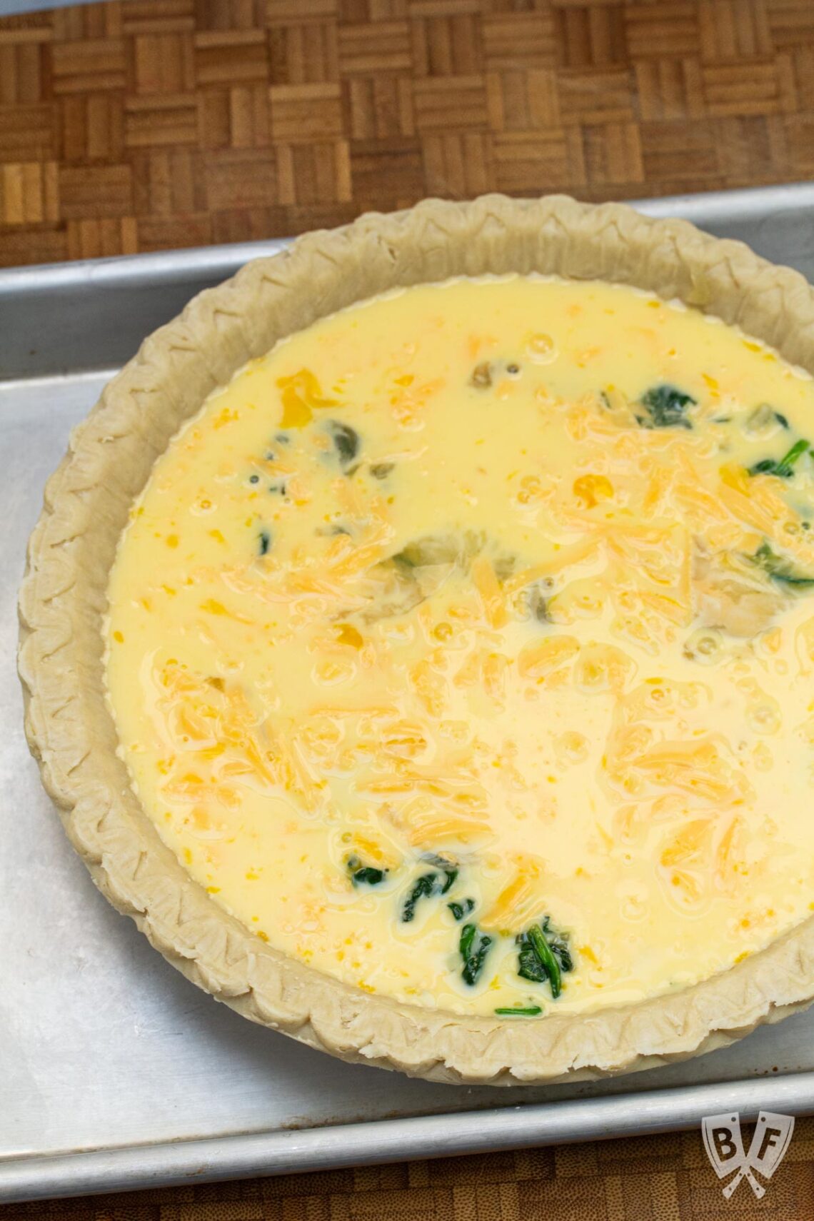 Baby Spinach and Cheddar Quiche Made with Fresh Spinach