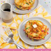 Overhead view of 2 plates of pancakes with text that reads, "birthday cake confetti pancakes with sprinkles - bigflavorstinykitchen.com".