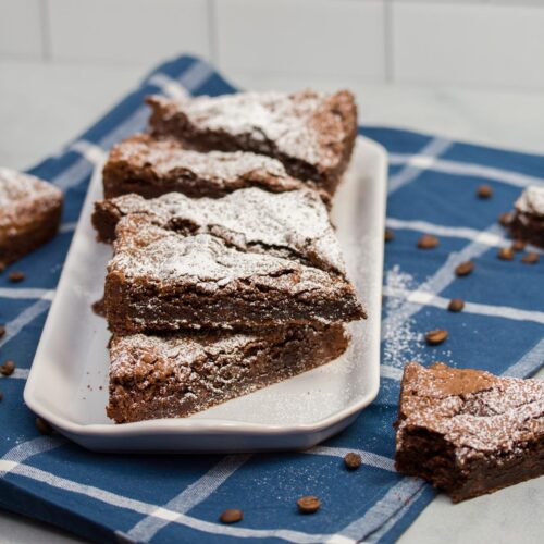 Espresso chocolate chip brownies on a serving tray.