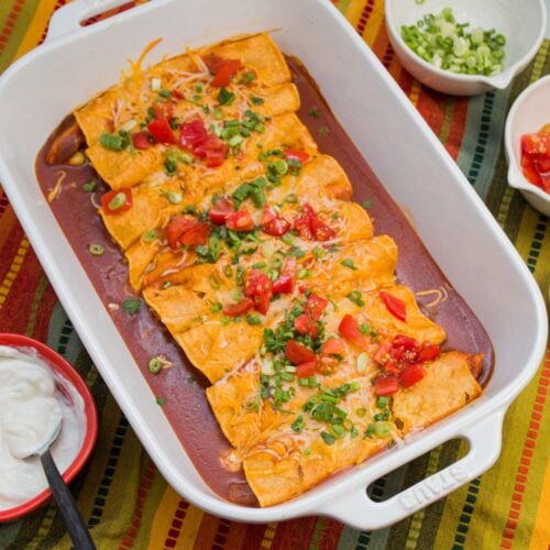Freshly baked tray of chicken enchiladas.
