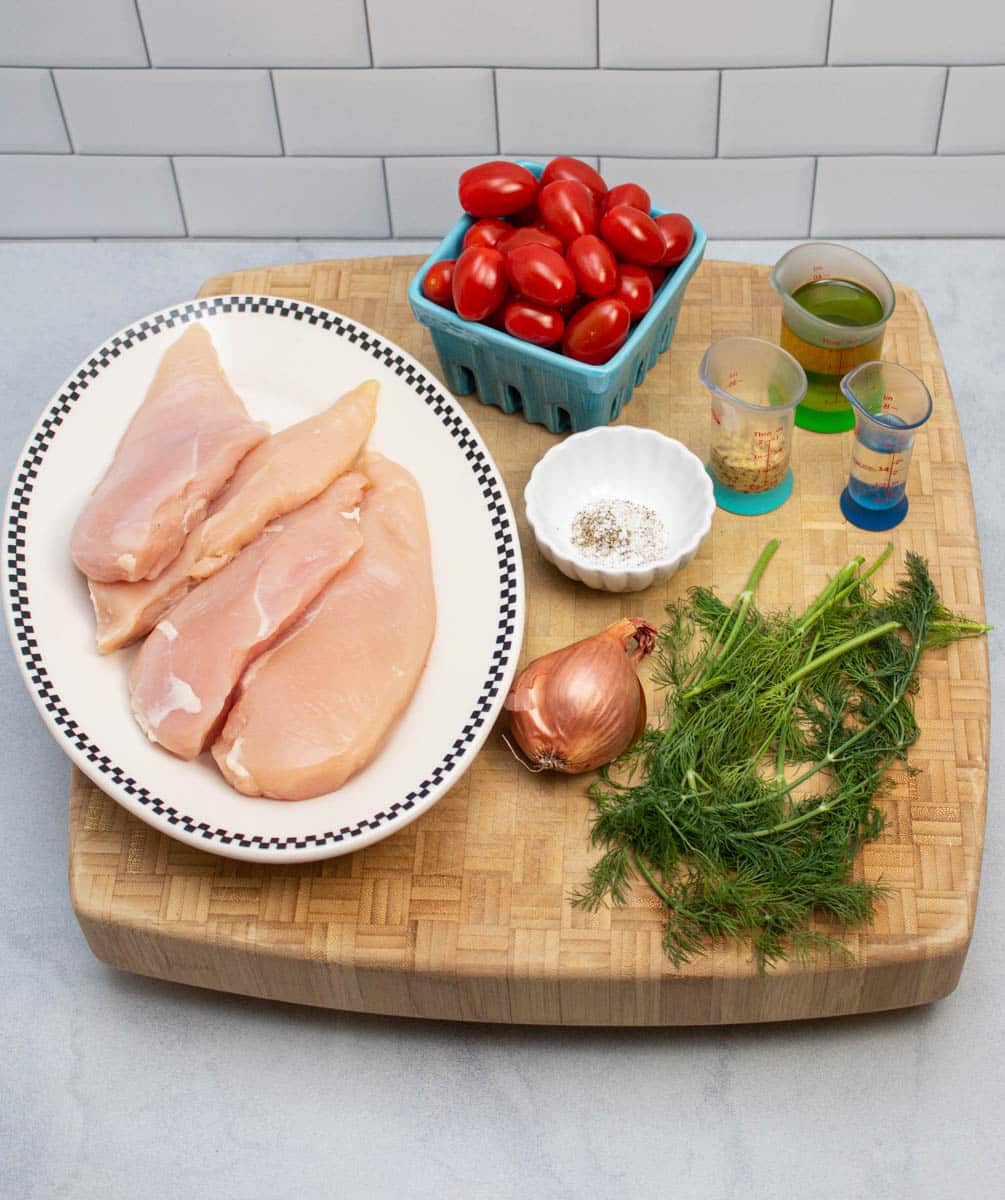 Ingredients ready to make dill chicken paillards with tomato-dill relish.