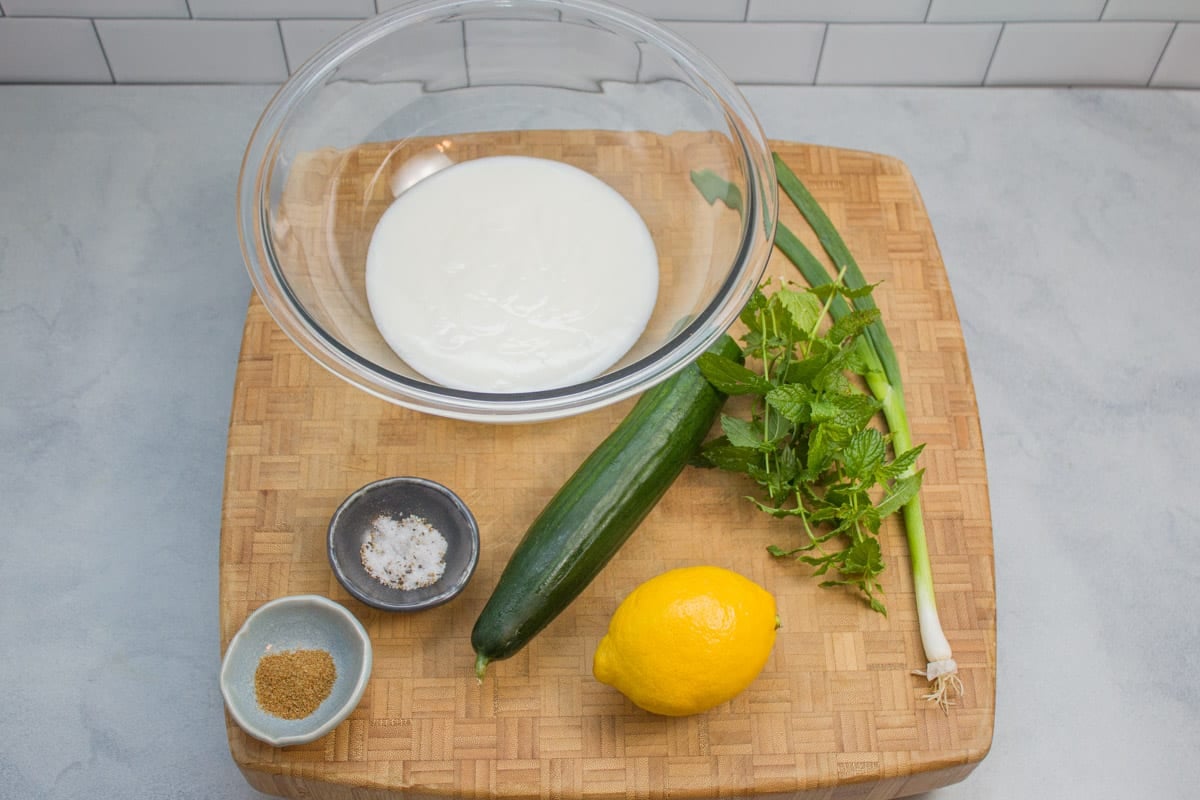 Ingredients ready to make cucumber raita.