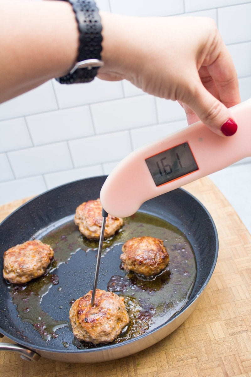 Using an instant read probe breakfast sausage patties.