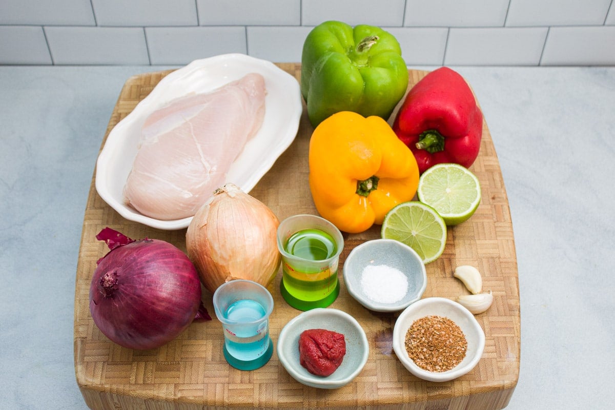 Ingredients ready to make sheet pan chicken fajitas.
