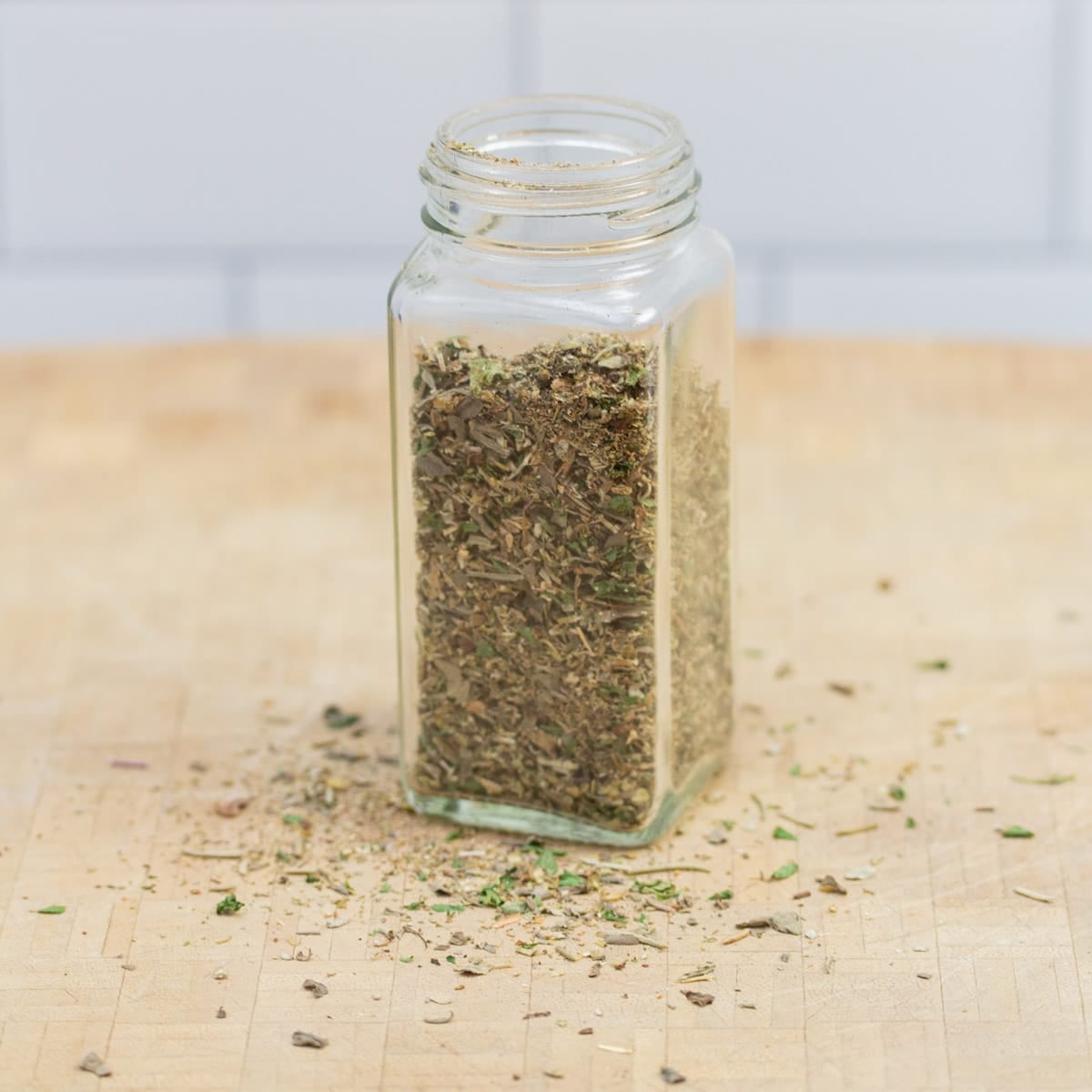 Jar of homemade Italian seasoning blend.
