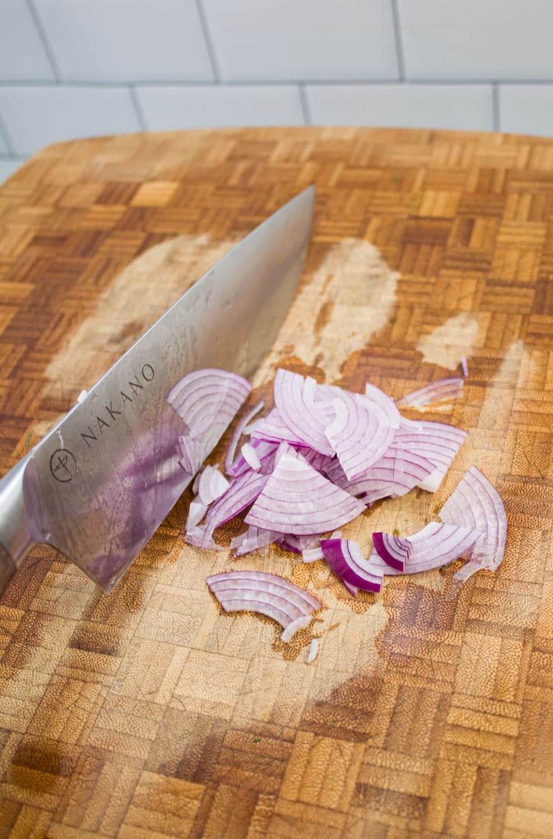 Slicing red onions.