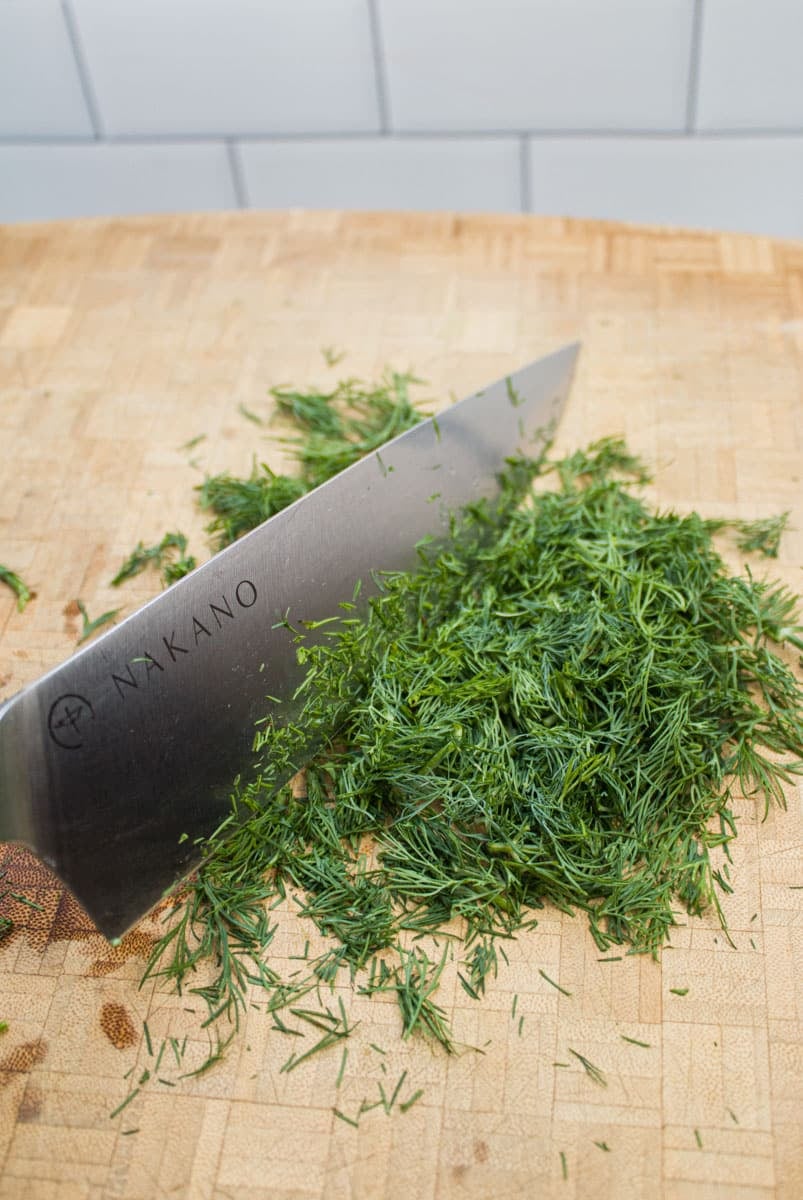 Chopping fresh dill.